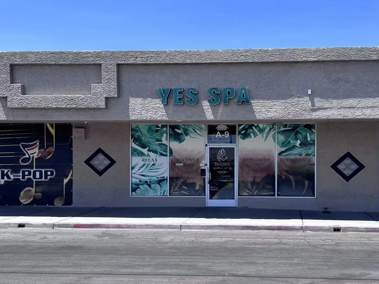 Storefront of Yes SPA on E Sahara Ave in Las Vegas, NV, with the YES SPA sign over suite A-9